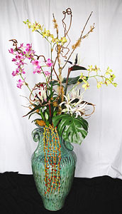 Tropical Silk Flower Arrangement in Bamboo